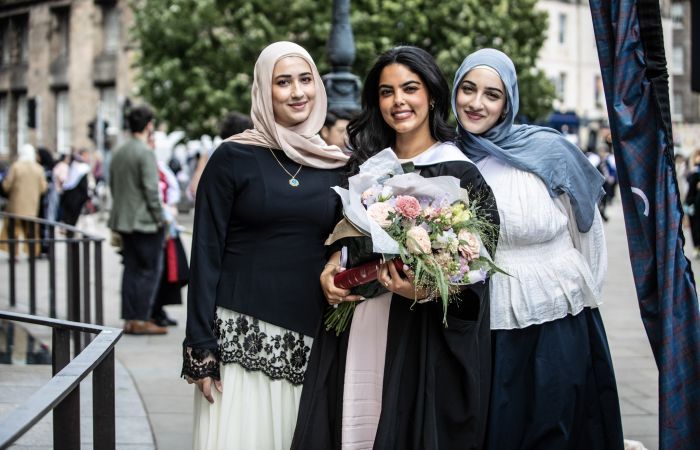 Students celebrating SPS Graduations in Bristo Square