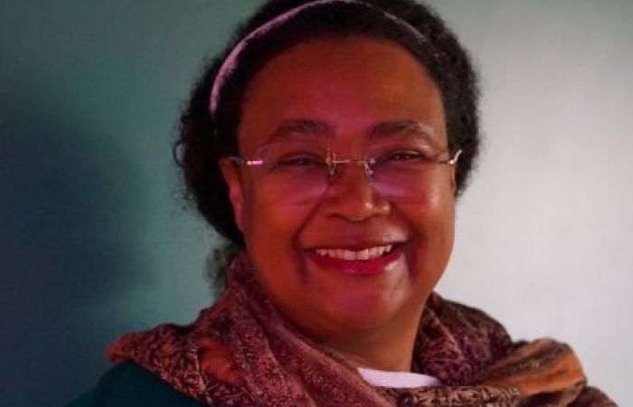 Dr Holbrook with golden scarf