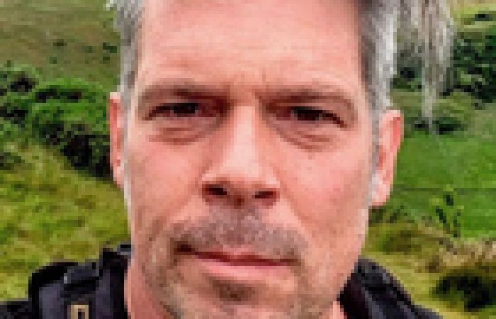 Head shot of Adam Cavill