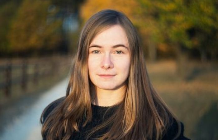 Portrait head shot of Jana taken outdoors