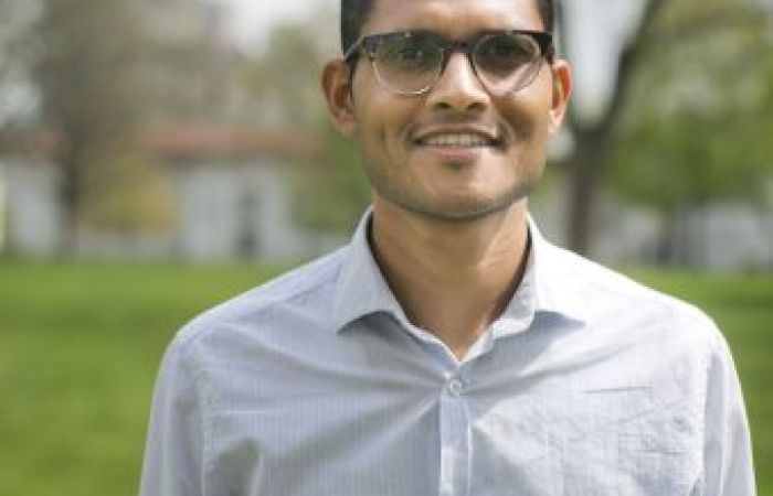 smiling man standing