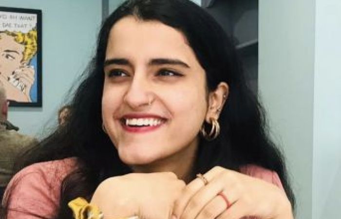 Smiling Picture in pink shirt. 